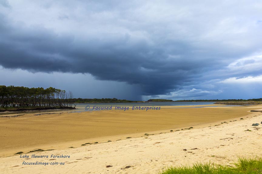Storm clouds over Lake Illawarra Foreshore New South Wales.