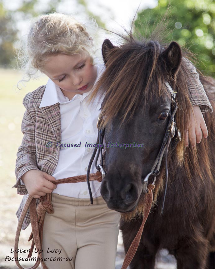 Little girl with Shetland Pony.