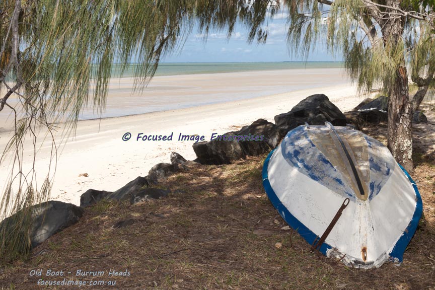 Old boat on the shore of Burrum Heads Southeast Queensland.
