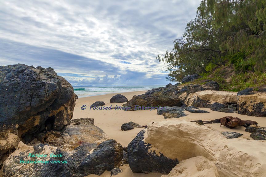 Sandy rocks on Rainbow Beach Southeast Queensland.